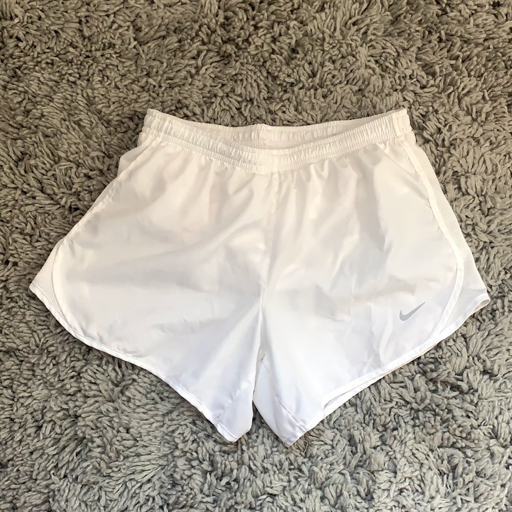 White Nike shorts. Size: Kids L (11-12)